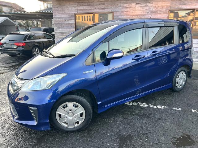 フリードハイブリッド ジャストセレクション　／検：２年付／走：４．３万ｋｍ／外ナビ／フリップダウン／Ｂカメラ／フルセグ／ＤＶＤ／Ｂｌｕｅｔｏｏｔｈ／左側電動スライド／ＨＩＤ／ＥＴＣ／スマキ－／クルコン／ＡＵＴＯエアコン／ドアバイザ－／Ｔチェ－ン（38枚目）