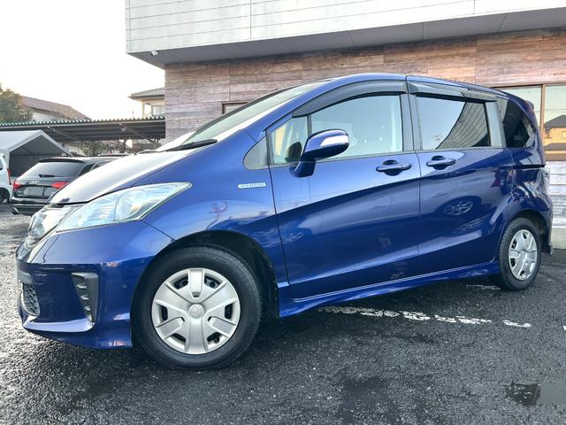 フリードハイブリッド ジャストセレクション　／検：２年付／走：４．３万ｋｍ／外ナビ／フリップダウン／Ｂカメラ／フルセグ／ＤＶＤ／Ｂｌｕｅｔｏｏｔｈ／左側電動スライド／ＨＩＤ／ＥＴＣ／スマキ－／クルコン／ＡＵＴＯエアコン／ドアバイザ－／Ｔチェ－ン（39枚目）