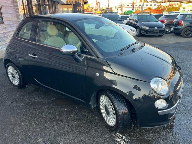 ５００ １．２　８Ｖ　ラウンジ　／車検：２年付き／走行距離：５．７万ｋｍ／ガラスサンルーフ／外ナビ／ワンセグ／純正１５インチＡＷ／外装色：クロスオーバーブラックメタリック／本革巻きステアリング／キ－レス／ＭＴモ－ド（29枚目）