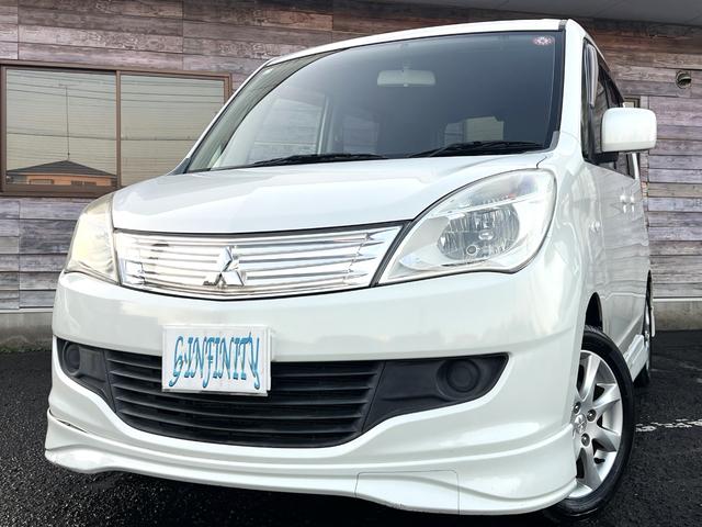 デリカＤ：２ Ｘ　／車検：２年付／社外ナビ／バックカメラ／フルセグ／ＤＶＤ視聴／左側電動スライドドア／純正１４ＡＷ／ＥＴＣ／スマ－トキ－／ＡＵＴＯエアコン／リアスポイラ－／ドアバイザ－／ＰＶガラス／Ｔチェ－ン（2枚目）