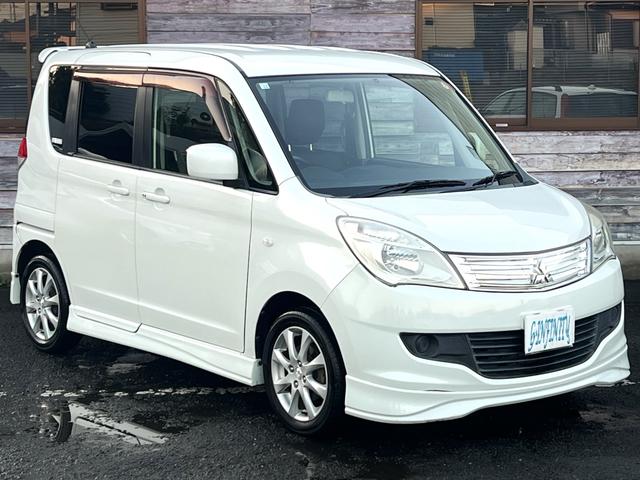 デリカＤ：２ Ｘ　／車検：２年付／社外ナビ／バックカメラ／フルセグ／ＤＶＤ視聴／左側電動スライドドア／純正１４ＡＷ／ＥＴＣ／スマ－トキ－／ＡＵＴＯエアコン／リアスポイラ－／ドアバイザ－／ＰＶガラス／Ｔチェ－ン（12枚目）