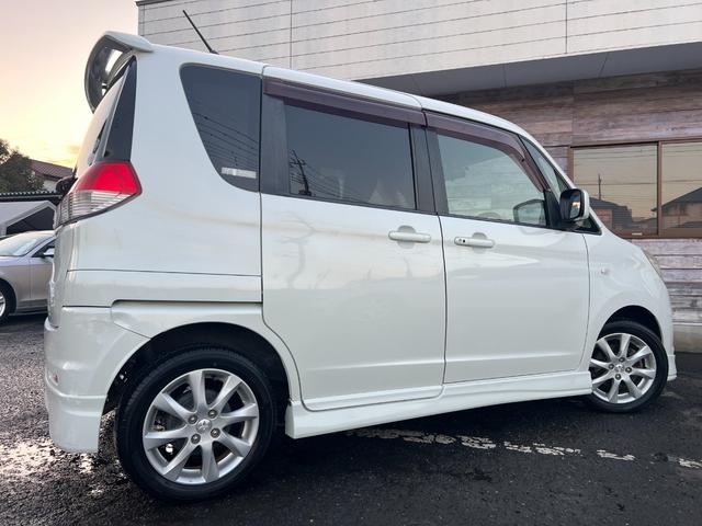 デリカＤ：２ Ｘ　／車検：２年付／社外ナビ／バックカメラ／フルセグ／ＤＶＤ視聴／左側電動スライドドア／純正１４ＡＷ／ＥＴＣ／スマ－トキ－／ＡＵＴＯエアコン／リアスポイラ－／ドアバイザ－／ＰＶガラス／Ｔチェ－ン（54枚目）