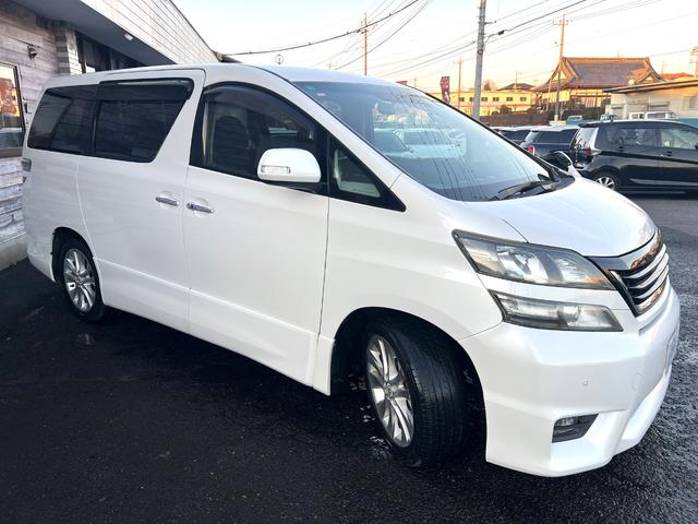 ヴェルファイア 2.4Z /車検:2年付/純ナビ/フリップダウン/バックカメラ/フルセグ/DVD/両側電動スライド/純18AW/HID/フォグ/ETC/ウッドコンビ革ステア/スマートキー/ドアバイザ-/PVガラス/Tチェ-ン(34枚目)