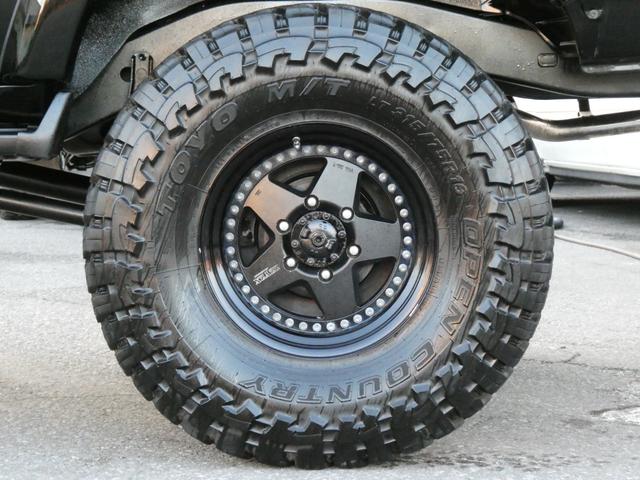 ランドクルーザー８０ ＶＸリミテッド　中期型　全塗装済　背面レス　ＡＲＢバンパー　５インチリフトアップ　輸出用角目四灯　ラグナ１６インチＡＷ　サファリシュノーケル　オールドマンエミューステダン　サクソンマフラー　リアラダー　社外スピーカー（24枚目）