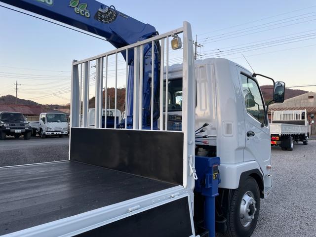 ファイター 　２．７ｔ　４段クレーン付き　　平ボディロング　　ラジコン付き　左電動格ミラー　　架装メーカータダノ　フックインあり　６速マニュアル　　クレーンの型式ＺＥ３０４ＨＲＮ　全塗装済みトラック（26枚目）