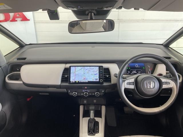 フィット e:HEVホーム ・当社デモカー・前後ドラレコ装着車 前後誤発進抑制機能 クリソナ 助手席エアバッグ 運転席エアバッグ 1オナ シートヒーター アイドリングストップ 禁煙 LEDライト バックカメラ ABS DVD再生(13枚目)