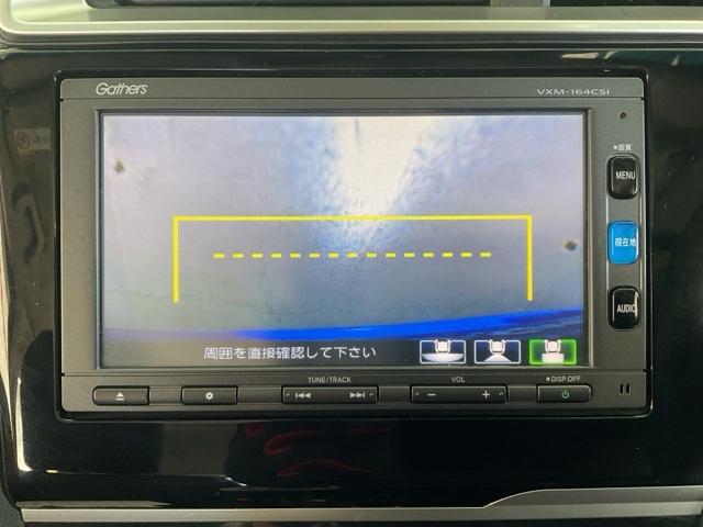 フィットハイブリッド Ｆパッケージ　・オールシーズンタイヤ装着車　盗難警報装置　ワンオ－ナ－車　ＡＵＴＯエアコン　助手席エアバック　禁煙　ＥＣＯＮ　リヤカメラ　ＡＢＳ付　横滑り防止システム　キーレスエントリー　運転席エアバック　ワンセグ（27枚目）