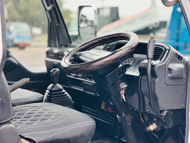 エルフトラック ３ｔ　セフテイローダーダンプ　ＨＡＮＡＭＩＭＡ？ＡＩセミワイドダンプ　４．８ＣＯＭＭＯＮ　ＲＡＩＬ　５速マニュアル　左電動格納ミラー　車検令和８年５月　ロックピンＸ２　ＥＴＣ（6枚目）