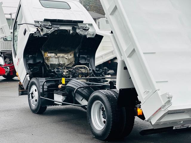 エルフトラック ３ｔ　セフテイローダーダンプ　ＨＡＮＡＭＩＭＡ？ＡＩセミワイドダンプ　４．８ＣＯＭＭＯＮ　ＲＡＩＬ　５速マニュアル　左電動格納ミラー　車検令和８年５月　ロックピンＸ２　ＥＴＣ（32枚目）