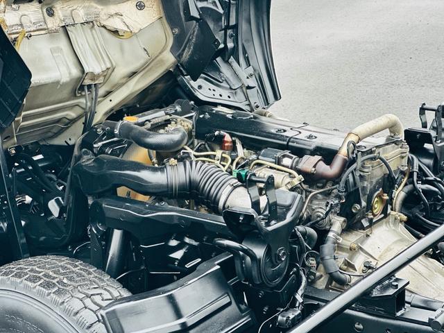 エルフトラック ３ｔ　セフテイローダーダンプ　ＨＡＮＡＭＩＭＡ？ＡＩセミワイドダンプ　４．８ＣＯＭＭＯＮ　ＲＡＩＬ　５速マニュアル　左電動格納ミラー　車検令和８年５月　ロックピンＸ２　ＥＴＣ（33枚目）