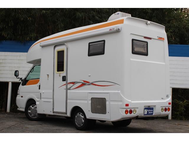 ボンゴトラック 　ロータスＲＶ　マンボウＥＶＥ　キャンピング車　家庭用エアコン　ホンダ製１６ｉ発電機　フィアマ製サイドオーニング　社外ショックアブソーバー　電子レンジ　冷蔵庫　ルーフベント　架装部テレビ　走行充電（27枚目）