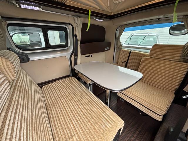 ＮＶ２００バネットバン キャンピングカー広島　ポップコン　シンク　給水・排水ポリタンク　走行充電　外部電源　シングルサブバッテリー　電動格納ミラー　ポップアップルーフ（26枚目）