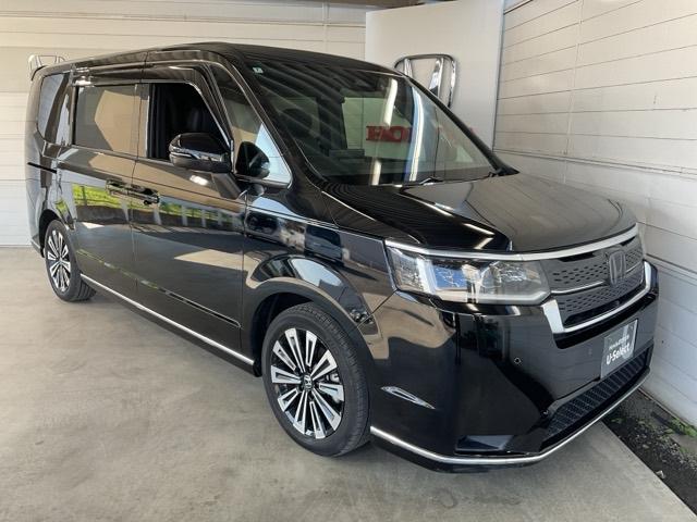 ステップワゴン ｅ：ＨＥＶスパーダプレミアムライン　・ひょう害修理済み車・前後ドラレコ装着車　マルチカメラ　Ｐテールゲート　両側自動ドア　Ｆセグ　クリアランスソナ　クルーズＣ　助手席エアバッグ　スマートＫ　シ－トヒ－タ－　サイドカメラ　ＤＶＤ再生　禁煙（10枚目）