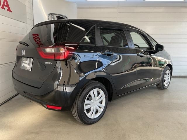 フィット e:HEVホーム ・当社デモカー・前後ドラレコ装着車 前後誤発進抑制機能 クリソナ 助手席エアバッグ 運転席エアバッグ 1オナ アイドリングストップ 禁煙 LEDライト バックカメラ ABS サイドエアバッグ キーレス(8枚目)