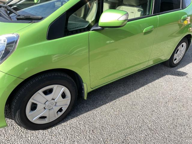 フィットハイブリッド ベースグレード　アイドリングストップ／ＣＤ／盗難防止装置／頸部衝撃緩和ヘッドレスト／運転席エアバック／助手席エアバック／クルーズコントロール／（34枚目）