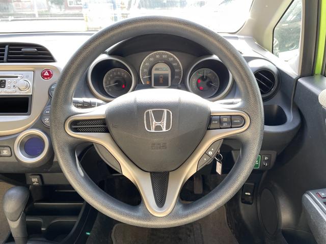 フィットハイブリッド ベースグレード　アイドリングストップ／ＣＤ／盗難防止装置／頸部衝撃緩和ヘッドレスト／運転席エアバック／助手席エアバック／クルーズコントロール／（44枚目）