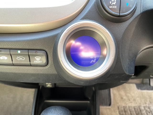 フィットハイブリッド ベースグレード　アイドリングストップ／ＣＤ／盗難防止装置／頸部衝撃緩和ヘッドレスト／運転席エアバック／助手席エアバック／クルーズコントロール／（53枚目）