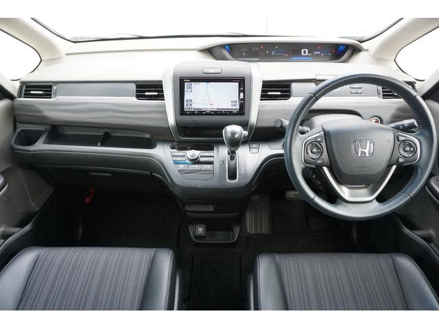 フリード Ｇ・ホンダセンシング　ホンダセンシング／衝突軽減ブレーキ／クルーズコントロール／ＬＥＤヘッドライト／両側電動スライドドア／ＥＴＣ／純正ナビ／バックカメラ／ＣＤ／ＤＶＤ／ＢｌｕｅｔｏｏｔｈＡｕｄｉｏ／２列目ベンチシート（2枚目）