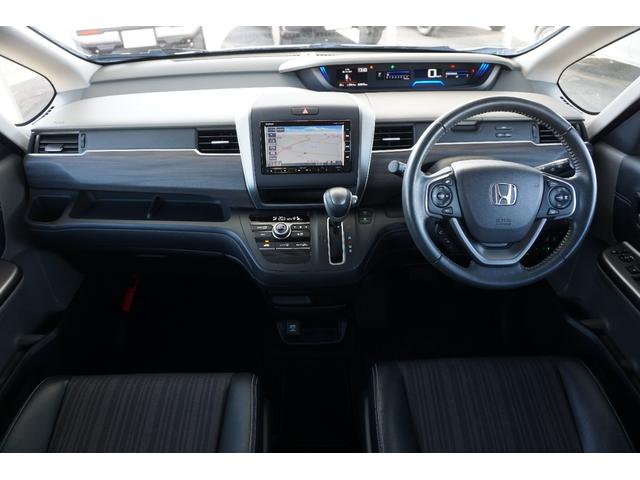 フリード Ｇ・ホンダセンシング　ホンダセンシング／衝突軽減ブレーキ／クルーズコントロール／フロントドラレコ／ＬＥＤヘッドライト／両側パワースライドドア／純正アルミホイール／ＥＴＣ／純正ナビ／バックカメラ／ＴＶ／ＢＴＡ／ＣＤ／ＤＶＤ（2枚目）