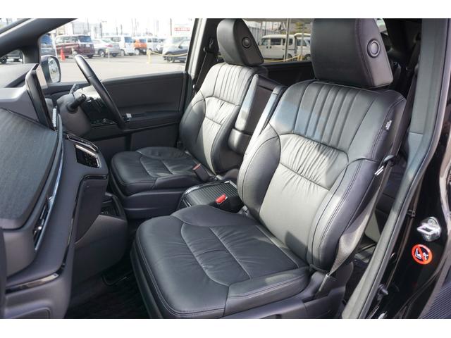 オデッセイハイブリッド e:HEVアブソルート・EXブラックエディション ホンダセンシング/衝突軽減ブレーキ/オートテールゲート/前後ドラレコ/ETC2.0/前後パーキングセンサー/シートヒーター/ワイヤレス充電器/パワーシート/オットマン/マルチビューカメラ/ナビ/USB(10枚目)