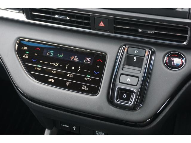 オデッセイハイブリッド e:HEVアブソルート・EXブラックエディション ホンダセンシング/衝突軽減ブレーキ/オートテールゲート/前後ドラレコ/ETC2.0/前後パーキングセンサー/シートヒーター/ワイヤレス充電器/パワーシート/オットマン/マルチビューカメラ/ナビ/USB(18枚目)