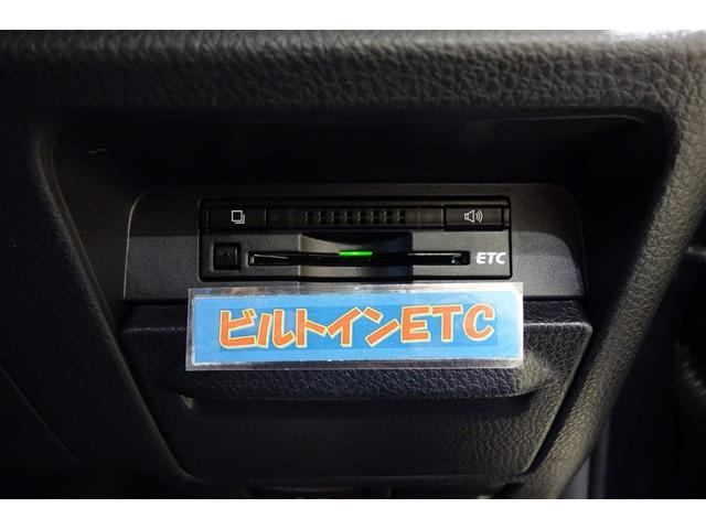 ヴォクシー ZS 両電動スライドドア 地デジ 盗難防止システム オートエアコン ダブルエアバッグ DVD再生可 ETC LEDヘッドライト キーレスエントリー メモリーナビ ナビTV AUX 3列シート 横滑り防止(17枚目)