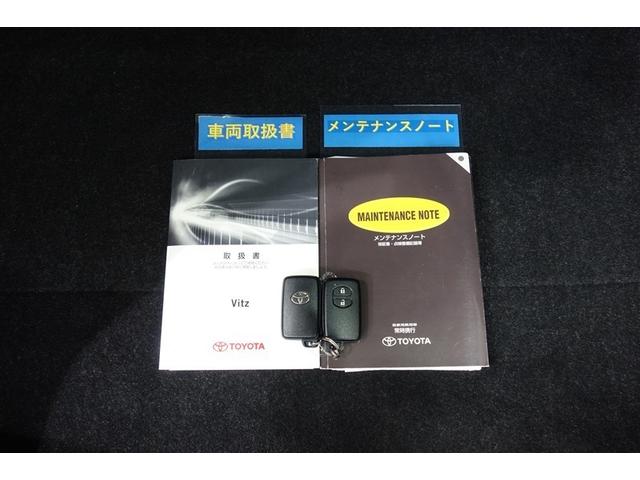 ヴィッツ F スマイルエディション スマートキー・プッシュスタート 整備点検記録簿 ワンセグTV 運転席助手席エアバッグ AUX接続 パワステ 盗難防止システム ナビTV メモリーナビ ワンオーナー パワーウィンドウ オートエアコン(27枚目)