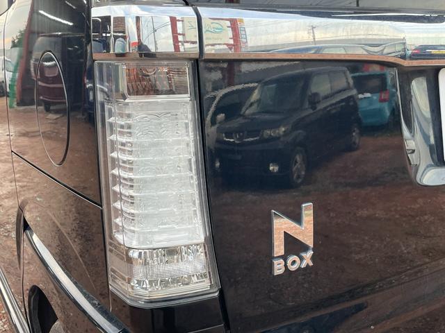 Ｎ－ＢＯＸカスタム Ｇ・Ｌパッケージ　バックカメラ　両側スライド・片側電動　ナビ　ＴＶ　オートライト　ＨＩＤ　スマートキー　アイドリングストップ　電動格納ミラー　ベンチシート　ＣＶＴ　盗難防止システム　ＡＢＳ　ＥＳＣ　ＣＤ　ＤＶＤ再生（33枚目）