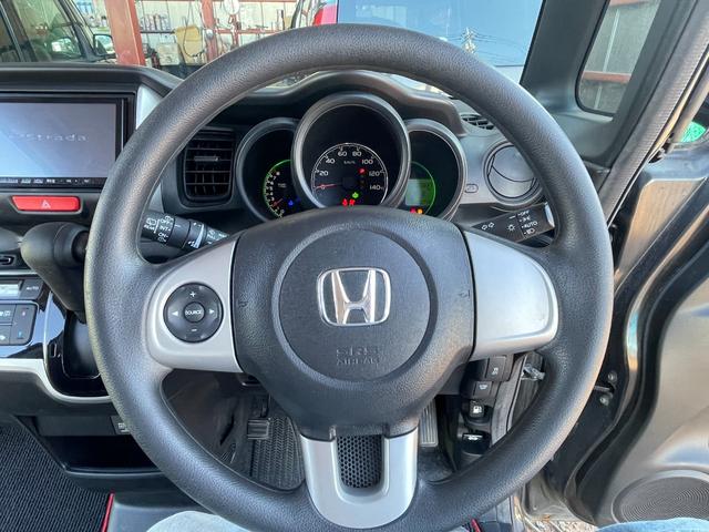 N-BOX G・Lパッケージ ETC バックカメラ 両側スライド・片側電動 ナビ TV オートライト スマートキー アイドリングストップ 電動格納ミラー ベンチシート CVT 盗難防止システム ABS ESC CD USB(3枚目)