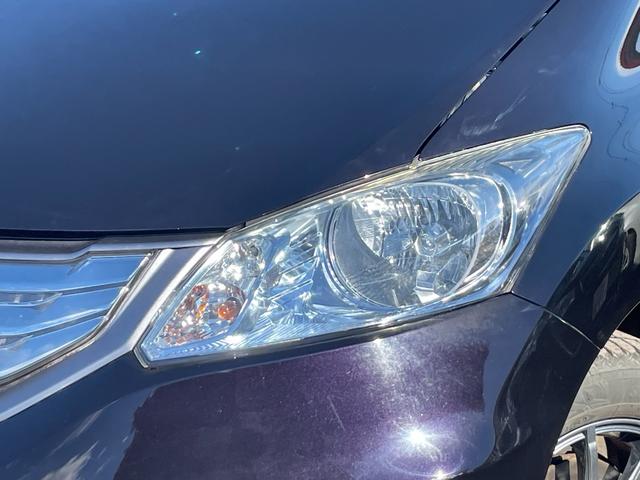 フリードハイブリッド ジャストセレクション　ＥＴＣ　バックカメラ　ナビ　ＴＶ　オートクルーズコントロール　両側電動スライドドア　ＨＩＤ　スマートキー　アイドリングストップ　電動格納ミラー　後席モニター　３列シート　ＣＶＴ　アルミホイール　ＵＳＢ（27枚目）