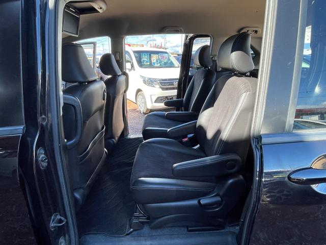 フリードハイブリッド ジャストセレクション　ＥＴＣ　バックカメラ　ナビ　ＴＶ　オートクルーズコントロール　両側電動スライドドア　ＨＩＤ　スマートキー　アイドリングストップ　電動格納ミラー　後席モニター　３列シート　ＣＶＴ　アルミホイール　ＵＳＢ（55枚目）