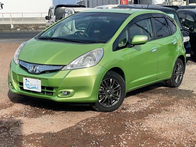 フィットハイブリッド スマートセレクション ハイブリッド ETC バックカメラ ナビ TV オートクルーズコントロール HID スマートキー 電動格納ミラー CVT 盗難防止システム 衝突安全ボディ アルミホイール CD チップアップシート(12枚目)