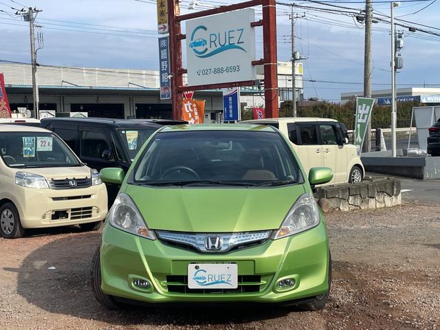 フィットハイブリッド スマートセレクション ハイブリッド ETC バックカメラ ナビ TV オートクルーズコントロール HID スマートキー 電動格納ミラー CVT 盗難防止システム 衝突安全ボディ アルミホイール CD チップアップシート(13枚目)