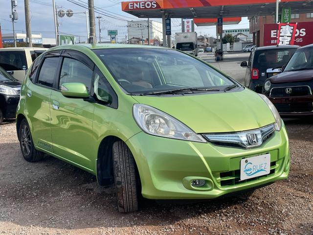 フィットハイブリッド スマートセレクション ハイブリッド ETC バックカメラ ナビ TV オートクルーズコントロール HID スマートキー 電動格納ミラー CVT 盗難防止システム 衝突安全ボディ アルミホイール CD チップアップシート(14枚目)