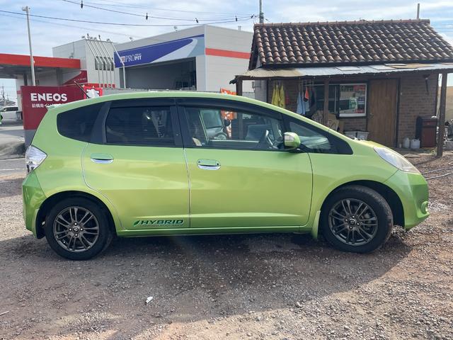 フィットハイブリッド スマートセレクション ハイブリッド ETC バックカメラ ナビ TV オートクルーズコントロール HID スマートキー 電動格納ミラー CVT 盗難防止システム 衝突安全ボディ アルミホイール CD チップアップシート(15枚目)