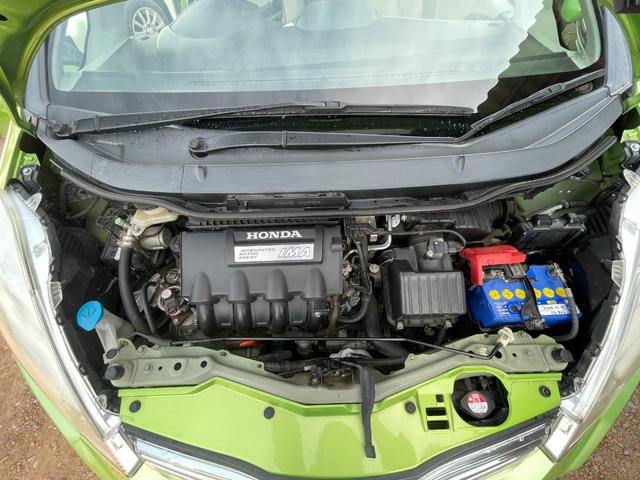 フィットハイブリッド スマートセレクション ハイブリッド ETC バックカメラ ナビ TV オートクルーズコントロール HID スマートキー 電動格納ミラー CVT 盗難防止システム 衝突安全ボディ アルミホイール CD チップアップシート(19枚目)