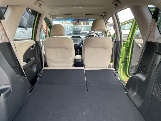 フィットハイブリッド スマートセレクション ハイブリッド ETC バックカメラ ナビ TV オートクルーズコントロール HID スマートキー 電動格納ミラー CVT 盗難防止システム 衝突安全ボディ アルミホイール CD チップアップシート(21枚目)