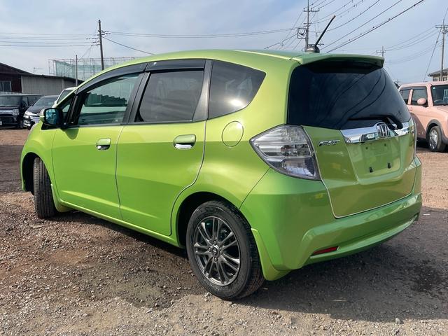 フィットハイブリッド スマートセレクション ハイブリッド ETC バックカメラ ナビ TV オートクルーズコントロール HID スマートキー 電動格納ミラー CVT 盗難防止システム 衝突安全ボディ アルミホイール CD チップアップシート(22枚目)