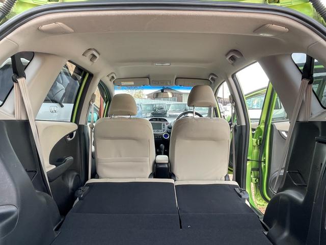 フィットハイブリッド スマートセレクション ハイブリッド ETC バックカメラ ナビ TV オートクルーズコントロール HID スマートキー 電動格納ミラー CVT 盗難防止システム 衝突安全ボディ アルミホイール CD チップアップシート(34枚目)