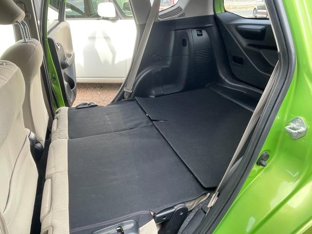 フィットハイブリッド スマートセレクション ハイブリッド ETC バックカメラ ナビ TV オートクルーズコントロール HID スマートキー 電動格納ミラー CVT 盗難防止システム 衝突安全ボディ アルミホイール CD チップアップシート(47枚目)