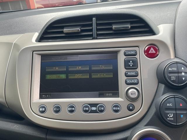 フィットハイブリッド スマートセレクション ハイブリッド ETC バックカメラ ナビ TV オートクルーズコントロール HID スマートキー 電動格納ミラー CVT 盗難防止システム 衝突安全ボディ アルミホイール CD チップアップシート(56枚目)