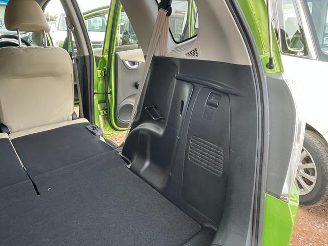 フィットハイブリッド スマートセレクション ハイブリッド ETC バックカメラ ナビ TV オートクルーズコントロール HID スマートキー 電動格納ミラー CVT 盗難防止システム 衝突安全ボディ アルミホイール CD チップアップシート(57枚目)