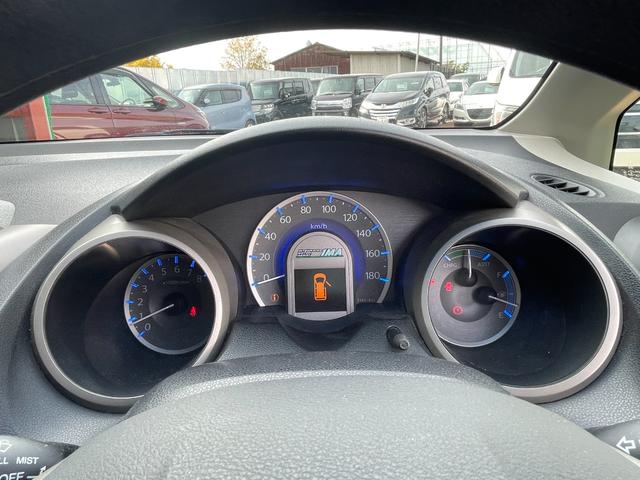 フィットハイブリッド スマートセレクション ハイブリッド ETC バックカメラ ナビ TV オートクルーズコントロール HID スマートキー 電動格納ミラー CVT 盗難防止システム 衝突安全ボディ アルミホイール CD チップアップシート(62枚目)