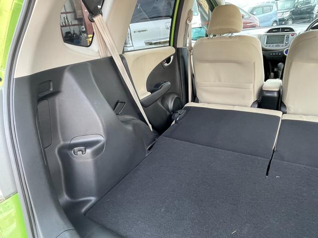 フィットハイブリッド スマートセレクション ハイブリッド ETC バックカメラ ナビ TV オートクルーズコントロール HID スマートキー 電動格納ミラー CVT 盗難防止システム 衝突安全ボディ アルミホイール CD チップアップシート(65枚目)