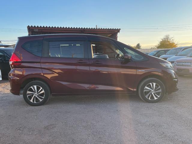 フリード＋ハイブリッド ハイブリッドＧ・ホンダセンシング　４ＷＤ　ハイブリッド　ドライブレコーダー　ＥＴＣ　バックカメラ　ナビ　両側電動スライドドア　オートクルーズコントロール　レーンアシスト　衝突被害軽減システム　オートライト　ＬＥＤヘッドランプ（14枚目）