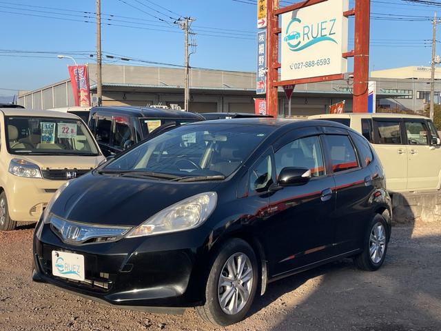 フィットハイブリッド ナビプレミアムセレクション　ハイブリッド　ＥＴＣ　バックカメラ　ナビ　ＴＶ　オートクルーズコントロール　ＨＩＤ　スマートキー　電動格納ミラー　シートヒーター　ＣＶＴ　盗難防止システム　衝突安全ボディ　アルミホイール　ＣＤ（12枚目）