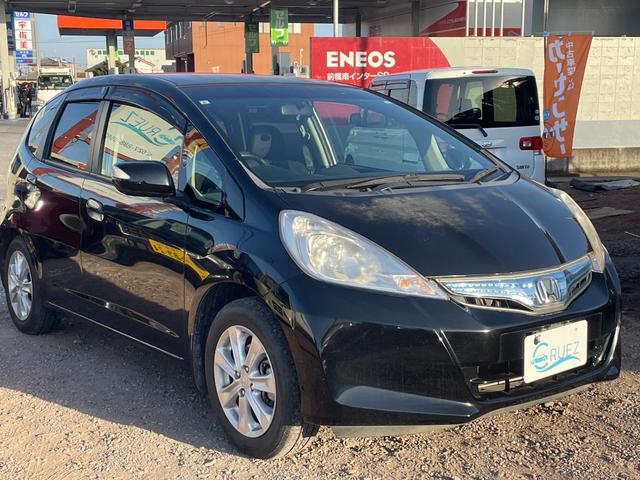 フィットハイブリッド ナビプレミアムセレクション　ハイブリッド　ＥＴＣ　バックカメラ　ナビ　ＴＶ　オートクルーズコントロール　ＨＩＤ　スマートキー　電動格納ミラー　シートヒーター　ＣＶＴ　盗難防止システム　衝突安全ボディ　アルミホイール　ＣＤ（14枚目）