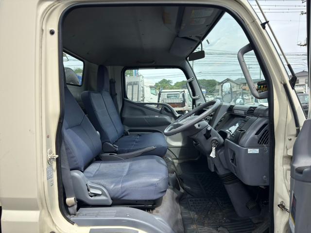 キャンター パッカー車　新明和製ＧＴ０５３モデル　プレス式　５．４立米　連続スイッチ付　最大積載量２７００ｋｇ　汚水タンク　ワイドボデー　５速マニュアル　４Ｍ５０エンジン　１５０馬力（47枚目）