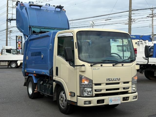 エルフトラック パッカー車　４．２立米　極東開発製プレス式パッカー　最大積載量２０００ｋｇ　左スライドドア　汚水タンク　ＬＥＤ電光掲示板　６速マニュアル（4枚目）