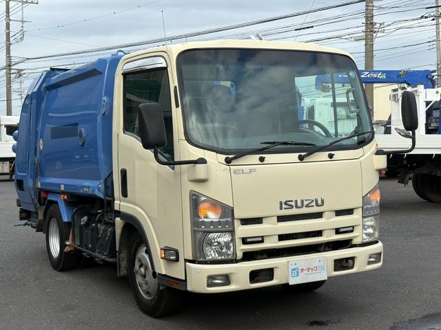 エルフトラック パッカー車　４．２立米　極東開発製プレス式パッカー　最大積載量２０００ｋｇ　左スライドドア　汚水タンク　ＬＥＤ電光掲示板　６速マニュアル（23枚目）
